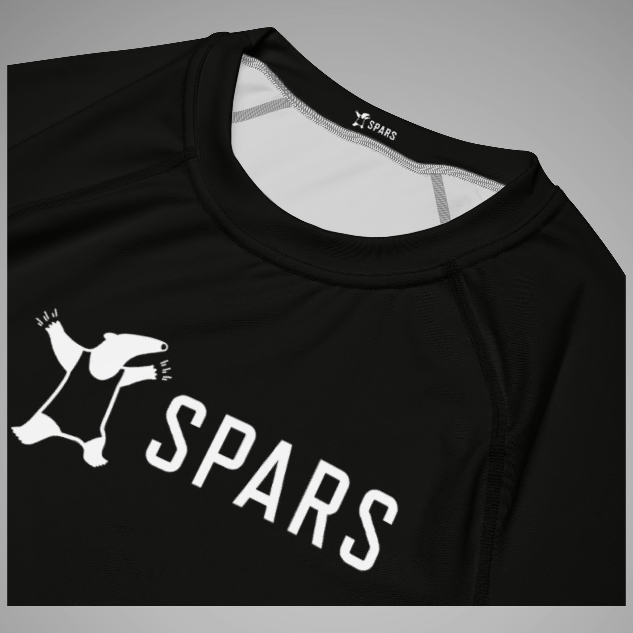 Men's BJJ Short Sleeve Rash Guard SPARS Logo Black Close-Up View 1