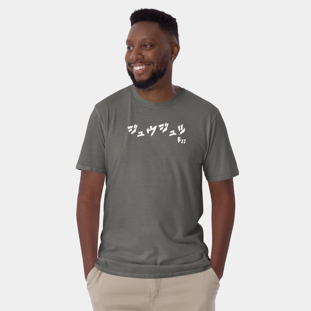 Male model wearing the Men’s BJJ KATAKANA Daily Tee in Charcoal, front view showing the white chest print.