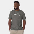 Male model wearing the Men’s BJJ KATAKANA Daily Tee in Charcoal, front view showing the white chest print.