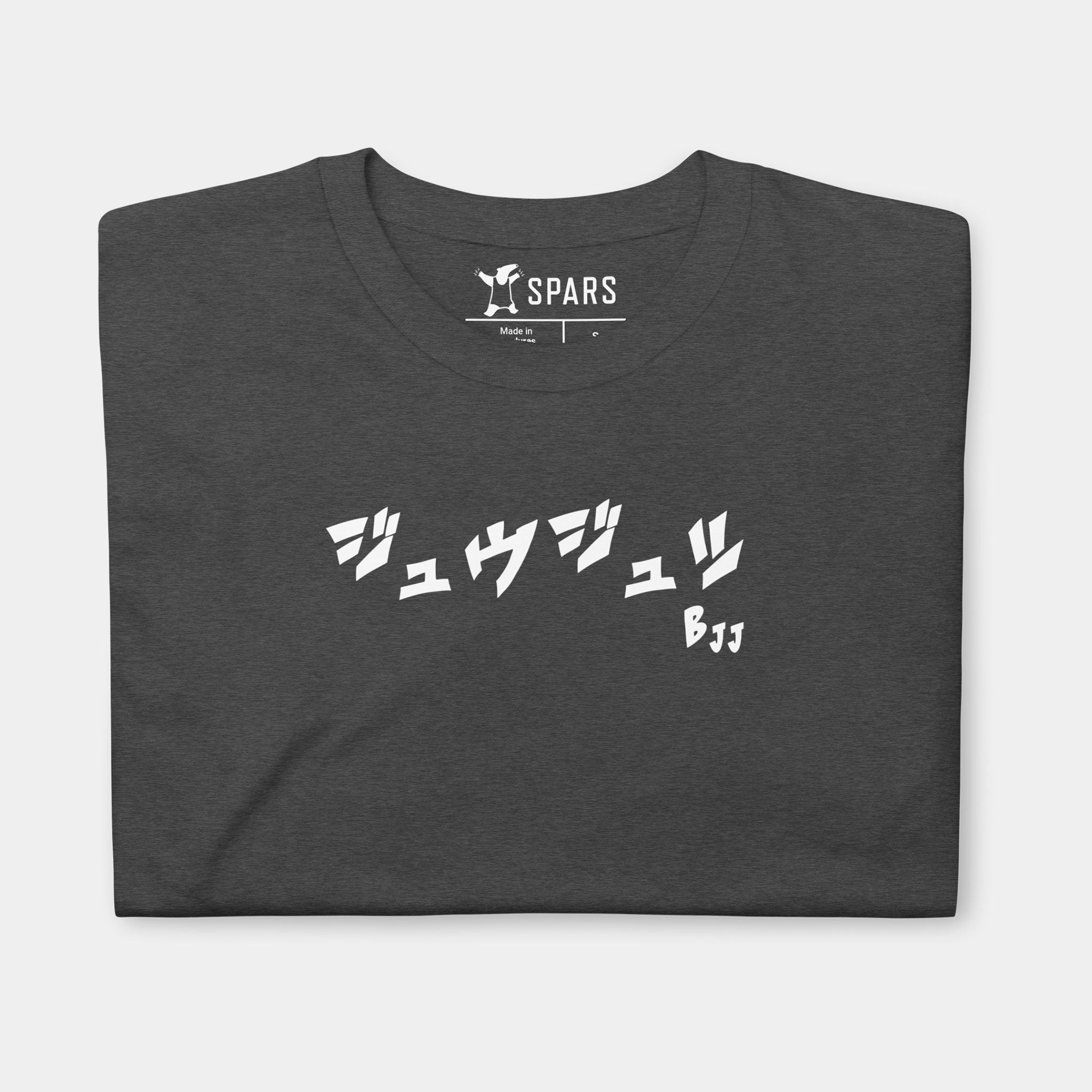 Folded Men’s BJJ KATAKANA Daily Tee in Dark Heather Grey showing the white BJJ katakana chest design