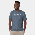Male model wearing the Men’s BJJ KATAKANA Daily Tee in Heather Indigo, front view