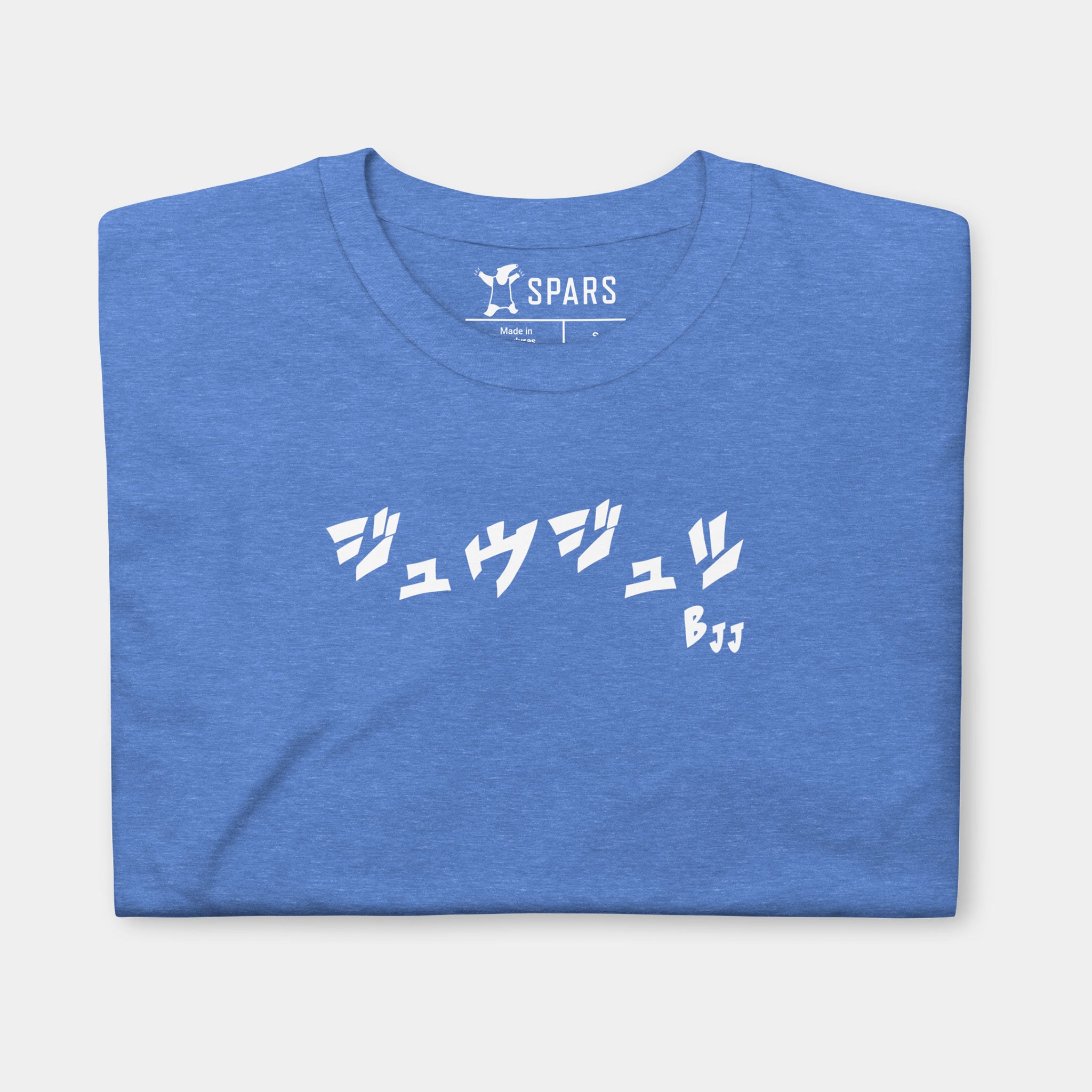 Folded Men’s BJJ KATAKANA Daily Tee in Heather Royal showing the white BJJ katakana chest design