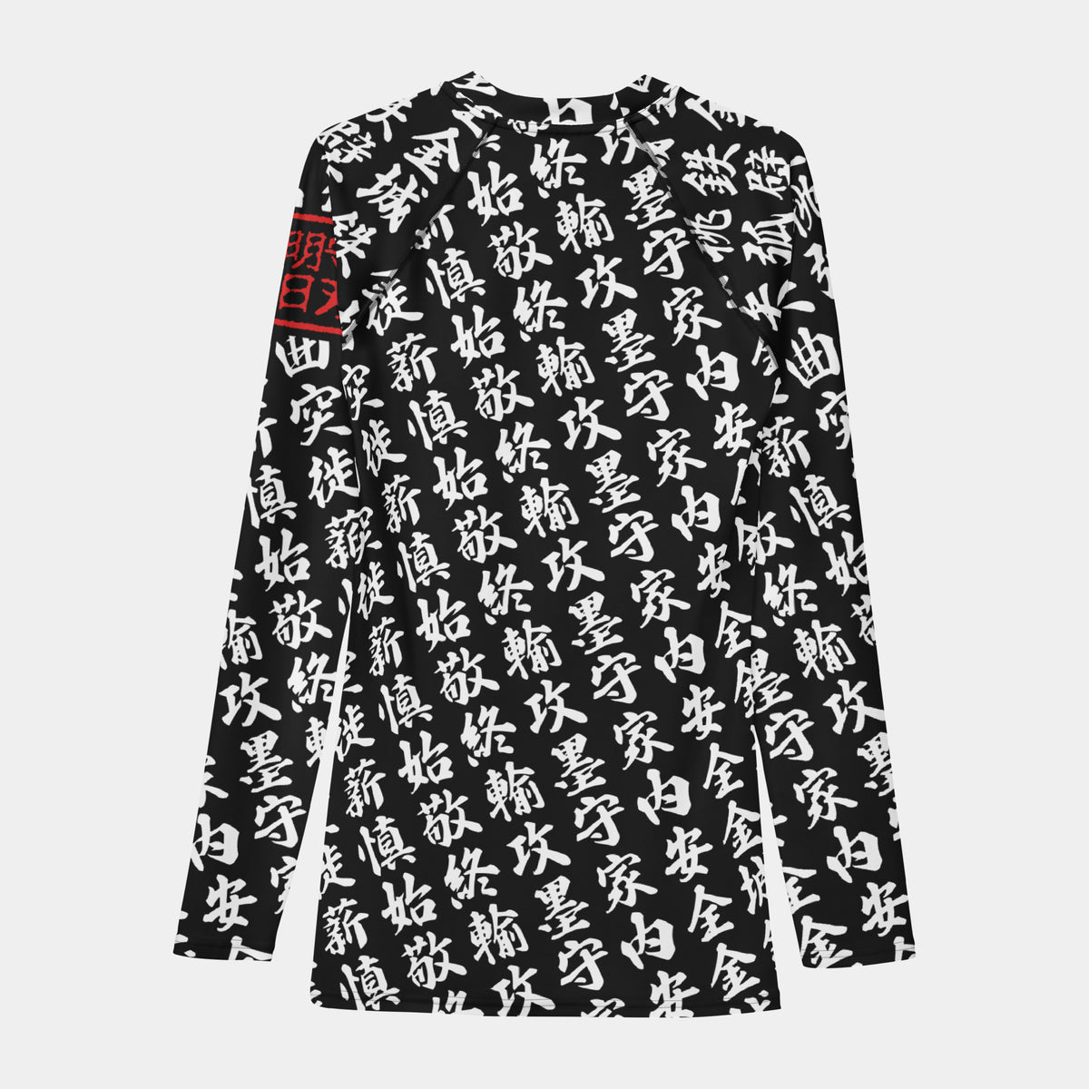 Back of the TOO MUCH KANJI long-sleeve BJJ rash guard in Iron Black and White, with the all-over white kanji print