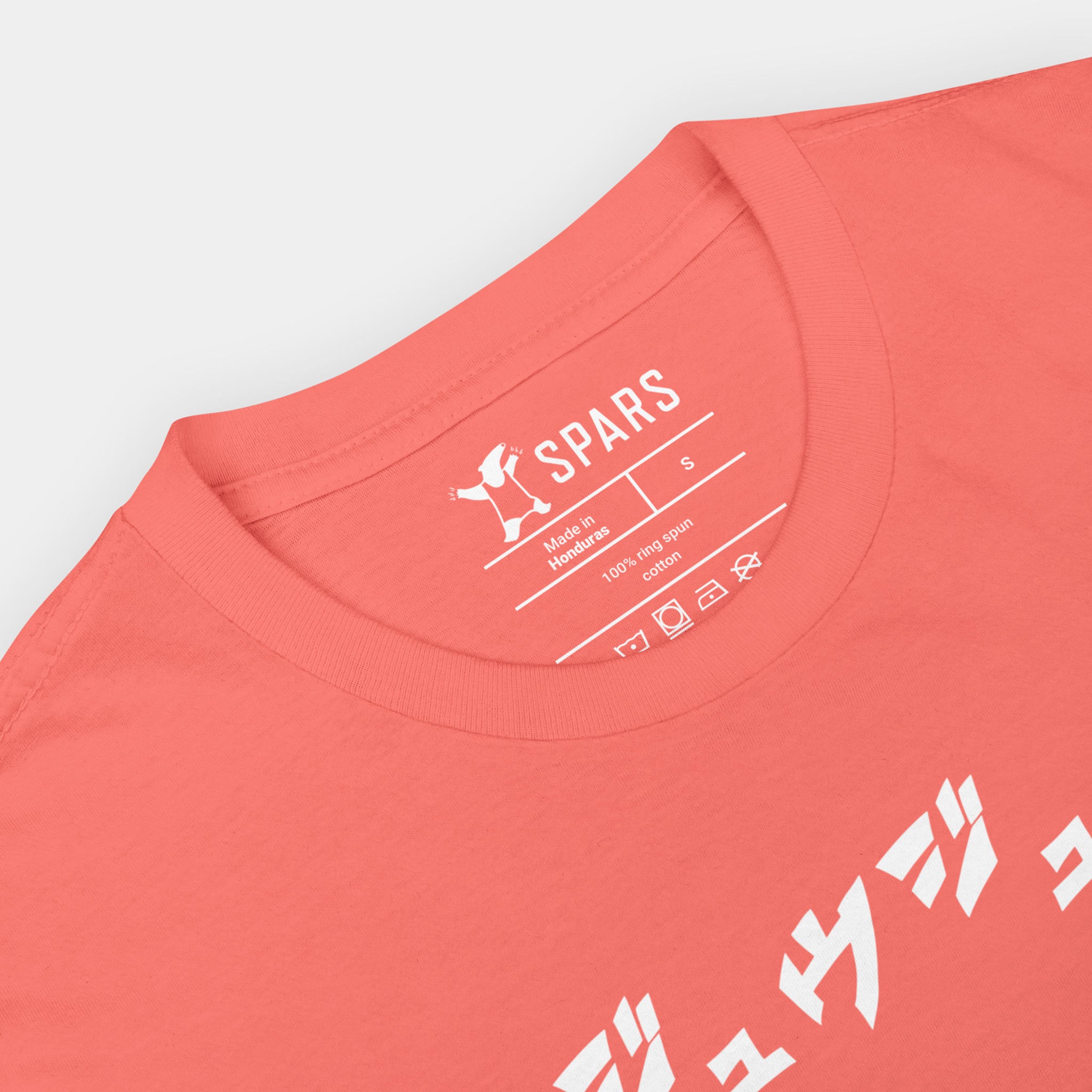 nside neck label and cotton fabric detail of the Women’s BJJ KATAKANA Daily Tee in Coral Silk