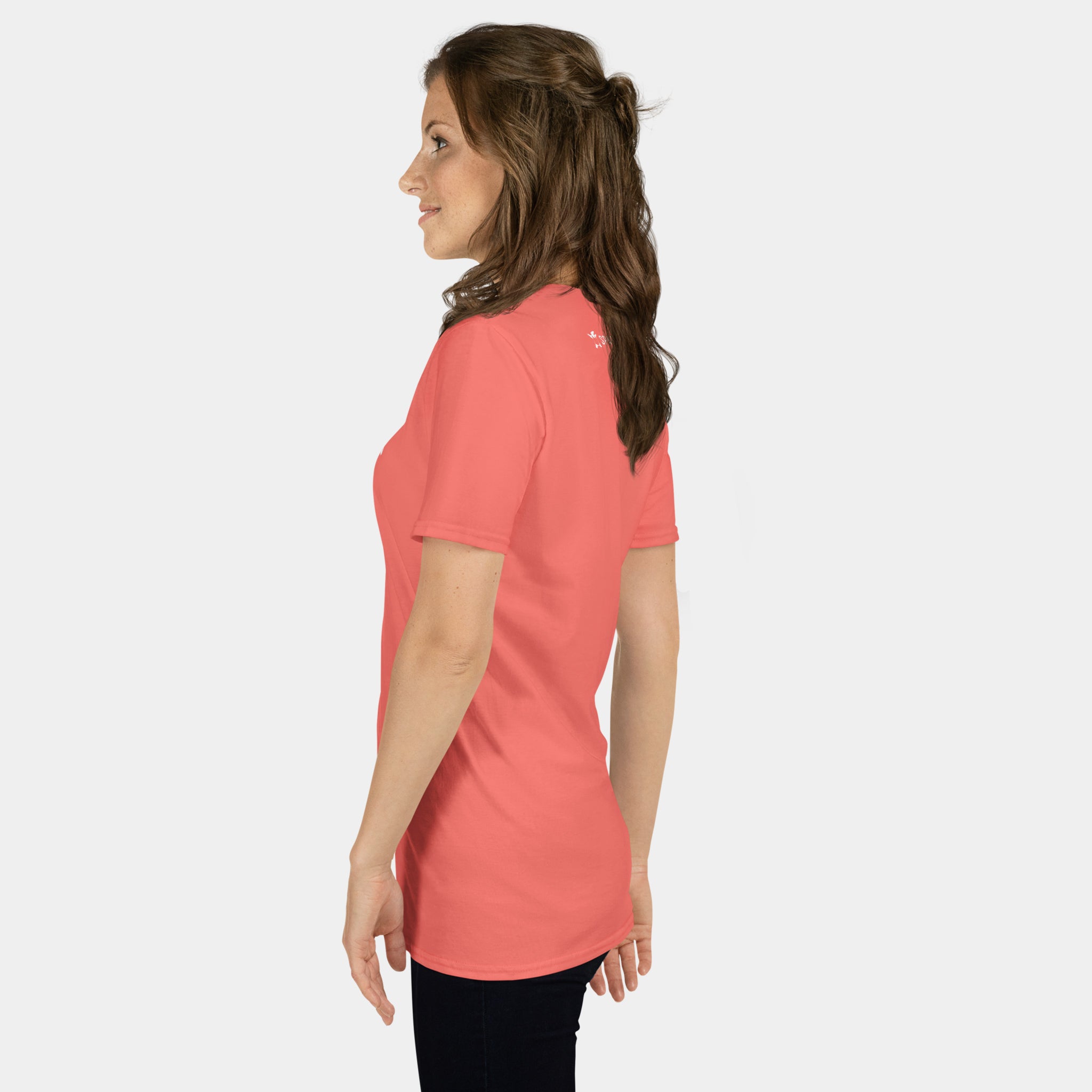 Woman wearing the Women’s BJJ KATAKANA Daily Tee in Coral Silk, left side view