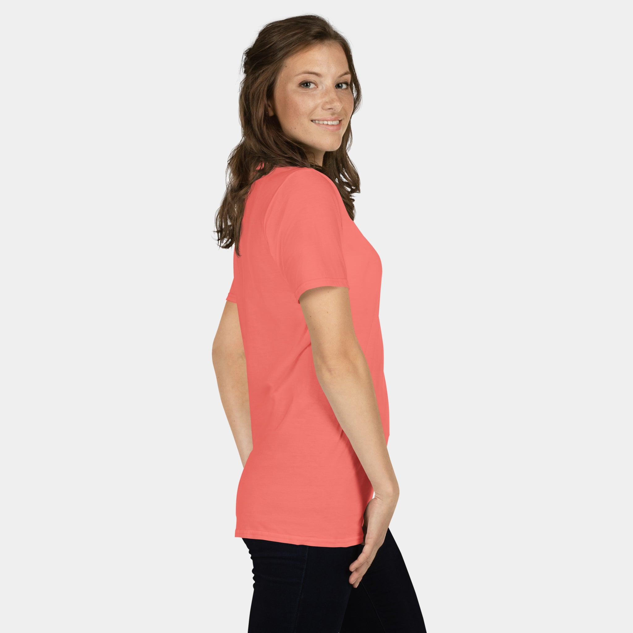 Woman wearing the Women’s BJJ KATAKANA Daily Tee in Coral Silk, right side view