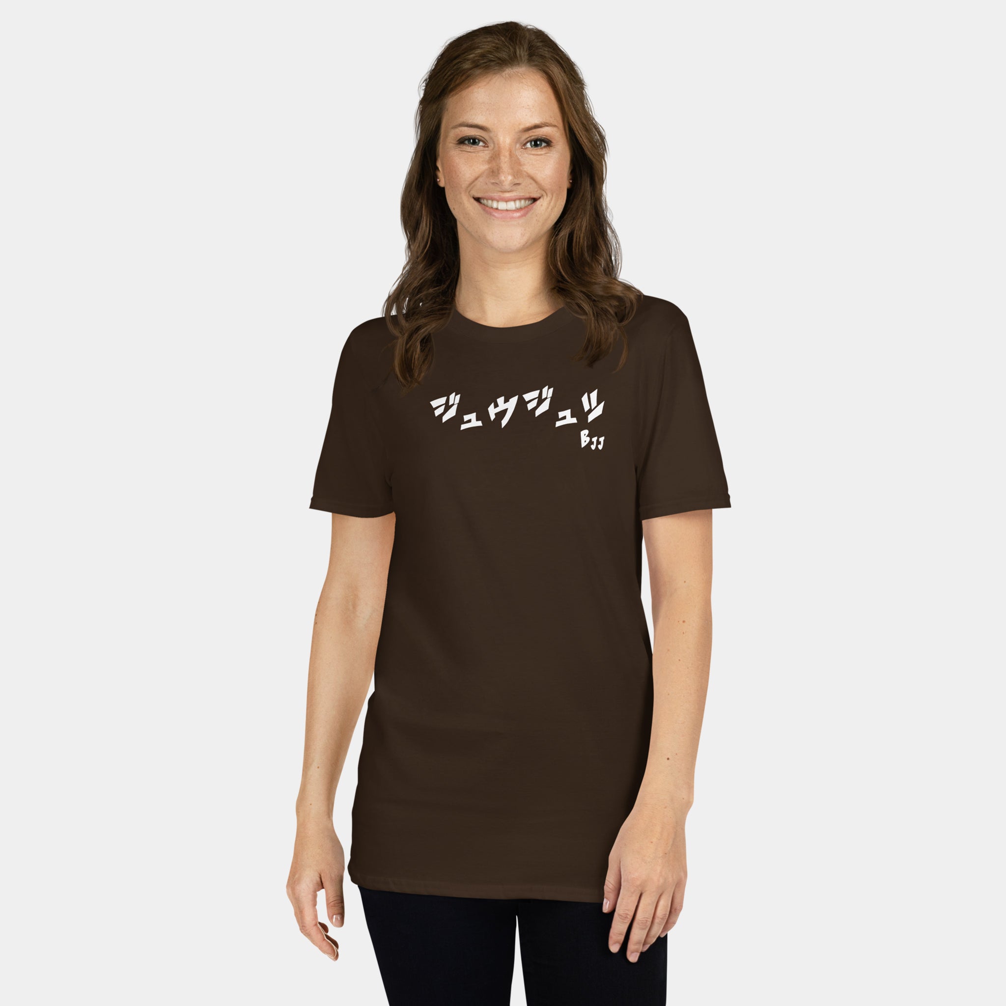 Woman wearing the Women’s BJJ KATAKANA Daily Tee in Dark Chocolate, front view showing the white chest print.