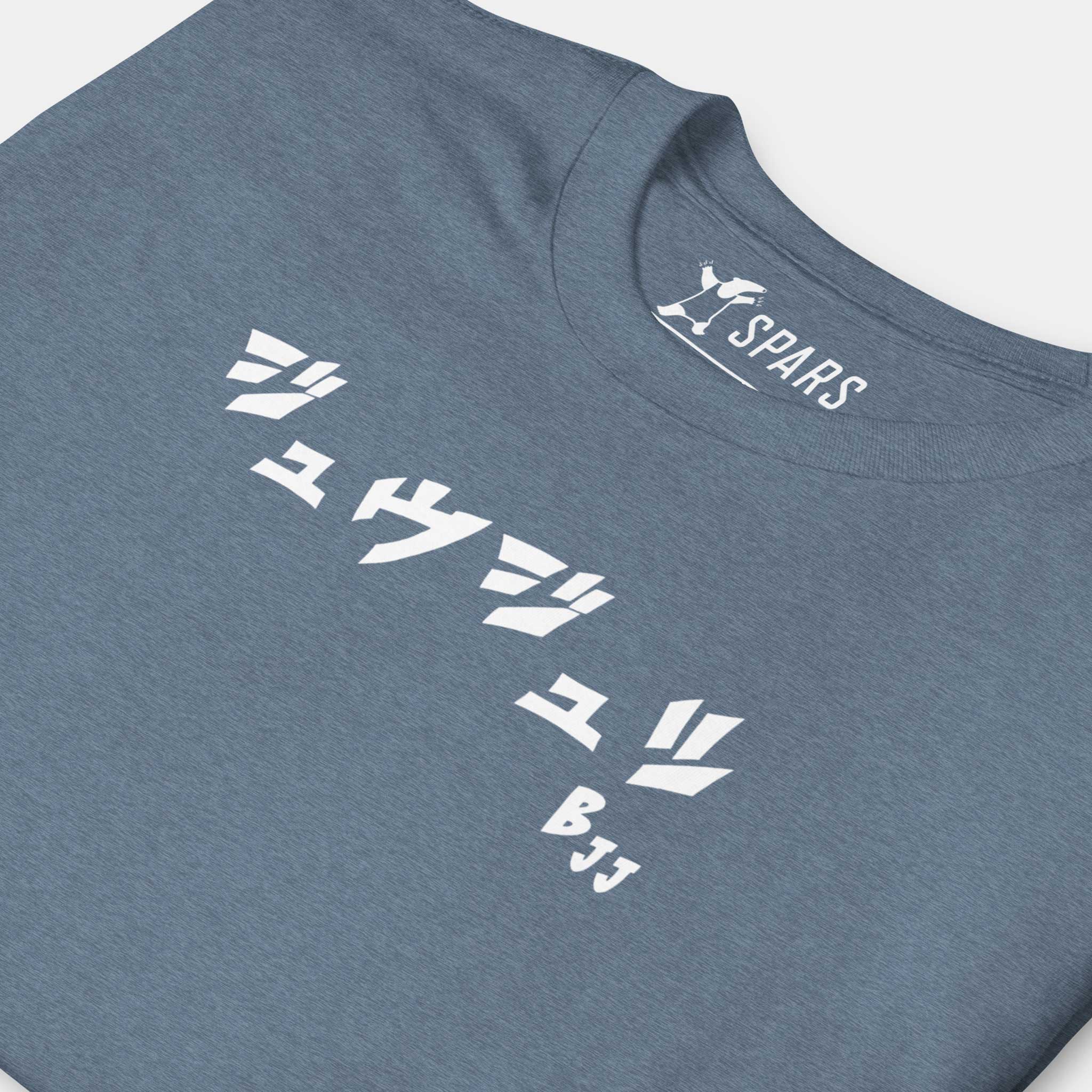Close-up of the white BJJ katakana chest design on the Women’s BJJ KATAKANA Daily Tee in Heather Indigo
