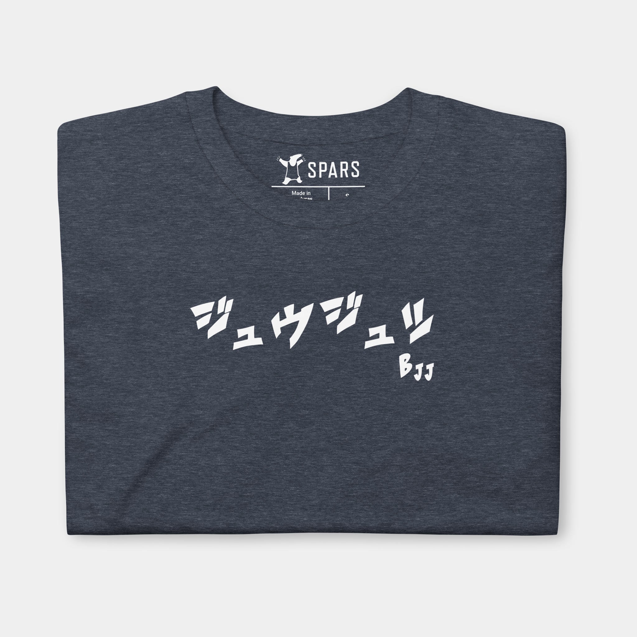 Folded Women’s BJJ KATAKANA Daily Tee in Heather Navy showing the white BJJ katakana chest design