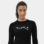 Woman wearing the Women’s BJJ KATAKANA Long-Sleeve Rash Guard in Iron Black, front view showing the off-white katakana and BJJ chest print