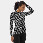 Right side view of the women's TOO MUCH KANJI long-sleeve BJJ rash guard in Iron Black and White on a model, showing the all-over white kanji print