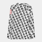 Back of the women's TOO MUCH KANJI long-sleeve BJJ rash guard in White and Black, with the all-over white kanji print