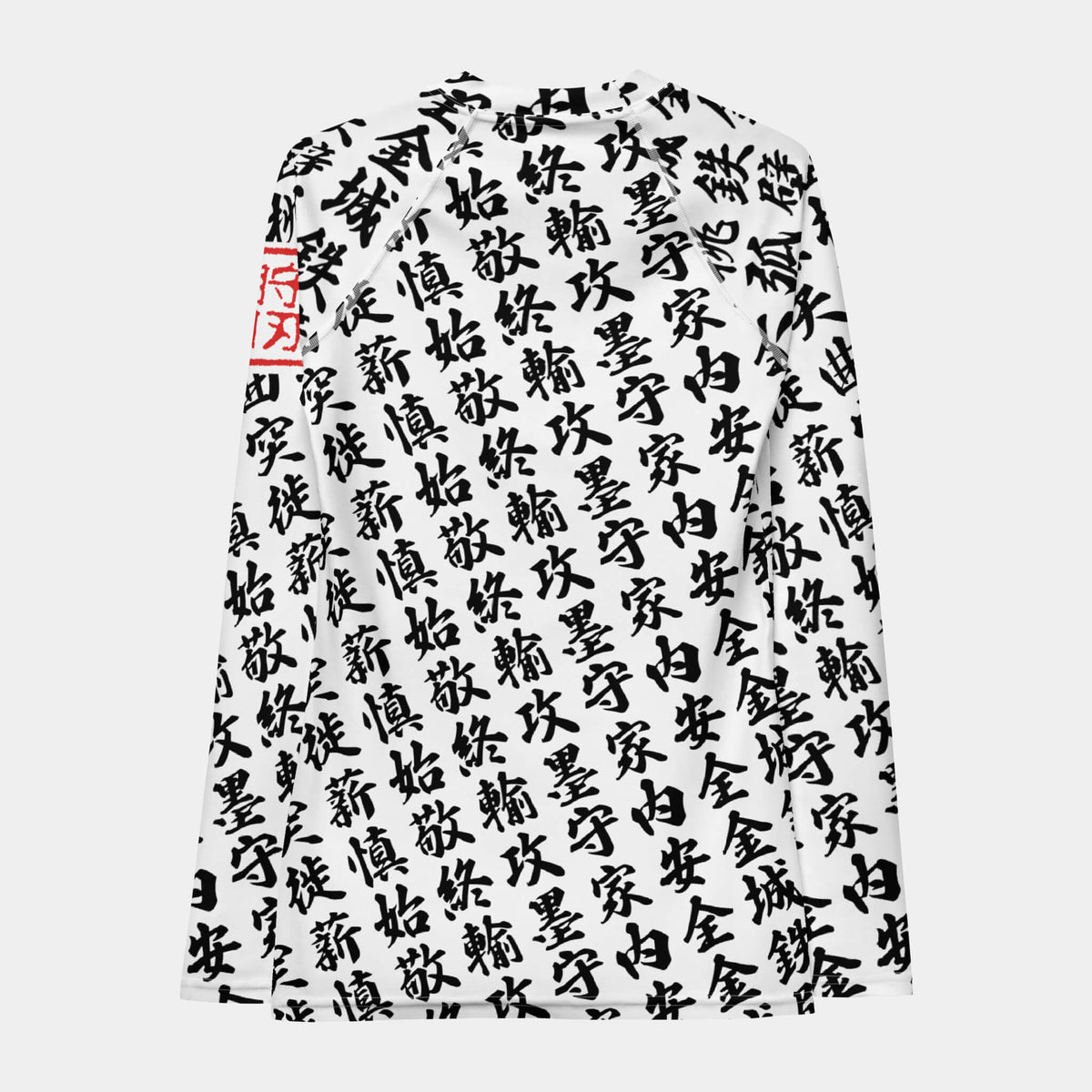 Back of the women's TOO MUCH KANJI long-sleeve BJJ rash guard in White and Black, with the all-over white kanji print
